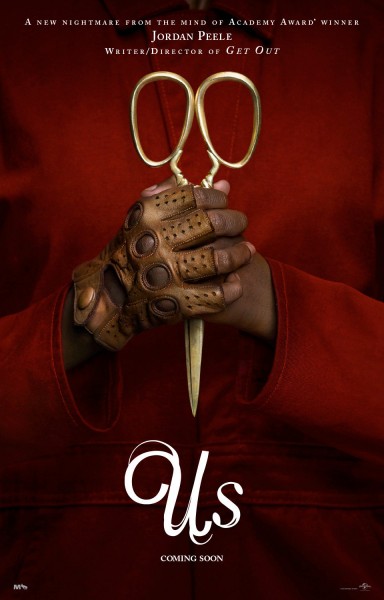 Us movie poster. Hands holding scissors